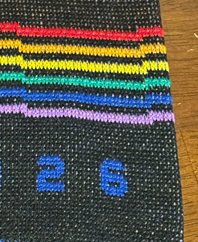 Coming soon: Dark Clouds 2026 Pride Scarf